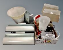 A large quantity of assorted wall lights, table lamps and shades.