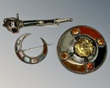 Three Scottish silver brooches set with agate.