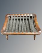 An Ercol elm and beech footstool in an antique finish (no cushion)