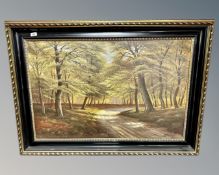 A. Jerlow : A track leading through a forest, oil on canvas, 99cm by 64cm.