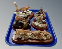 A tray containing five Border Fine Arts figures on wooden plinths including snowy trail FT03.