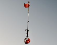 A petrol strimmer.