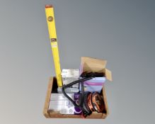 A box containing Cooke & Lewis kitchen lever mixer tap, foot pumps, extension lead,