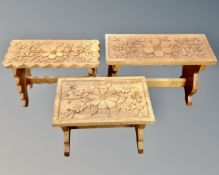 Three carved oak crackets.