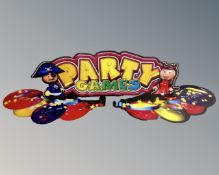 A Party Games perspex illuminated sign.