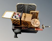 A box containing folding spark guard, concertina sewing box, wooden panel, cobblers last,