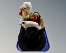 A tray containing Renegade cowboy hat, a camel soft toy and a further Borzoi dog soft toy.
