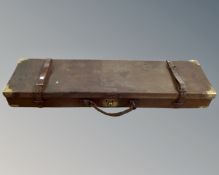 A vintage gun cleaning kit in case.