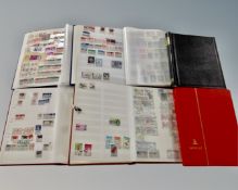 Six albums containing vintage world stamps.