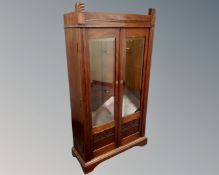 A Scandinavian Art Deco double door bookcase with glazed doors (width 84cm)