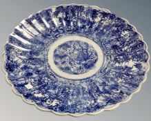 A Chinese blue and white scalloped edge imari plate.