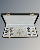 An assortment of 12 sterling silver rings.