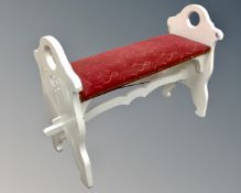 An Arts and Crafts painted window stool (width 97cm)