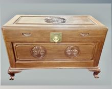 A 20th century carved camphor wood box.