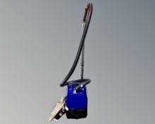 An AEG Vampyr 6400 cylinder vacuum together with hoover bags.