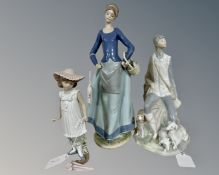 Three Nao figures, My Pet No. 1218G, April Showers No. 1126G and Shepherd No.