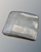 A Sterling silver cigarette case, 124.7g, 8 cm x 8.5 cm.