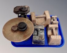 A tray of a set of antique kitchen scales with weights together with four further cast iron Avery