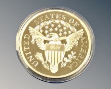 Three gold plated Elizabeth II commemorative coins