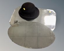 A gent's top hat together with two Art Deco frameless mirrors.