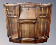 A 1930s oak side by side bureau bookcase.