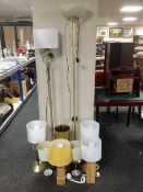 A contemporary standard lap together with pair of matching table lamps with shades,