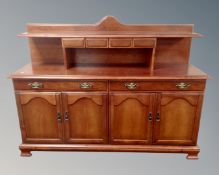 A White & Newton four door buffet back sideboard (width 155cm)