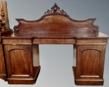 A 19th century mahogany twin pedestal sideboard (width 184cm)