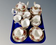 Twenty seven pieces of Royal Albert Old Country Roses tea china (teapot as found)