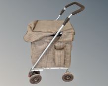 A Sholley four wheel shopping trolley
