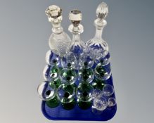 A tray containing three lead crystal decanters,