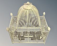 A decorative metal hanging bird cage,