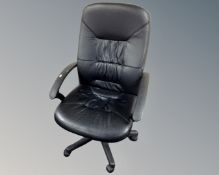 An executive high backed office armchair.