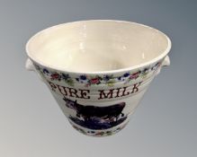 A ceramic milk maid's twin-handled bucket,