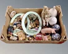 A box containing a pair of English ceramic oval frames, animal ornaments, blue and white porcelain.