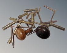 A bag containing eight brass and steel crank, Vienna and longcase clock keys.