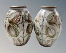 A pair of Denby floral decorated pottery vases (height 30cm)