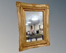 An 18th century style gilt framed mirror.