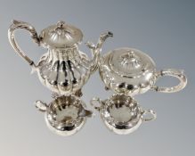 A four piece silver plated tea set.