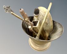 A 19th century copper coal bucket containing companion pieces.