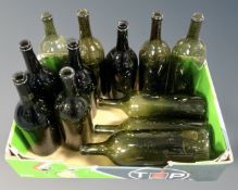 A box of twelve vintage wine bottles