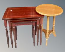 A teak effect double door bookcase fitted with cupboards beneath,
