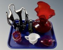 A tray of six pieces of coloured glass ware to include Davidsons glass jugs,