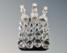 A tray containing three lead crystal decanters,