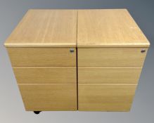A pair of office three drawer desk pedestals.