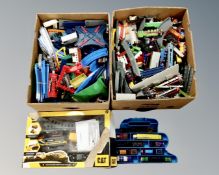 Two boxes containing assorted toys including Thomas the Tank Engine track,
