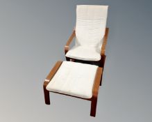 An Ikea beech framed armchair and footstool