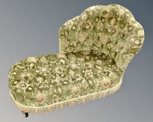 A chaise lounge in buttoned and tasseled upholstery,