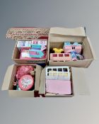 Three boxes containing a large quantity of Sindy items including buildings, figures etc.