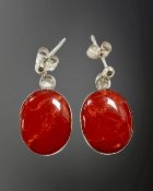 A pair of silver and red agate earrings with post fittings, stones 17mm by 13.5mm.